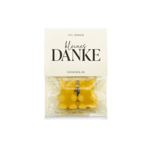 eine Tüte mit gelben süßen Bären, Teebären mit kleines Danke